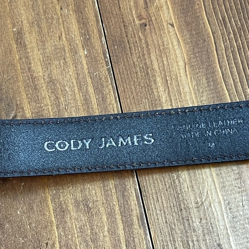 Cody James kids size medium brown leather belt with pistol buckle